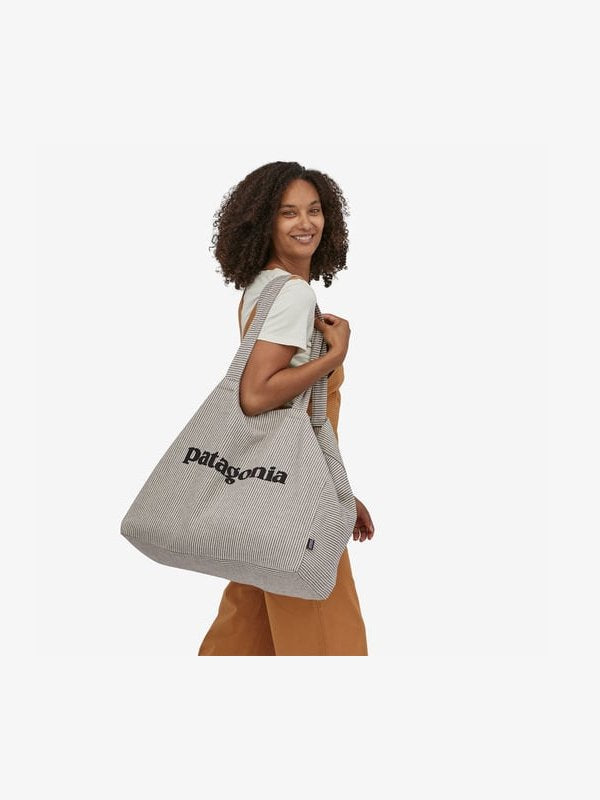 patagonia recycled pfd bag Black Hole Duffel Outdoor New England Its large main compartment ReCrafted Wader Tote Bag